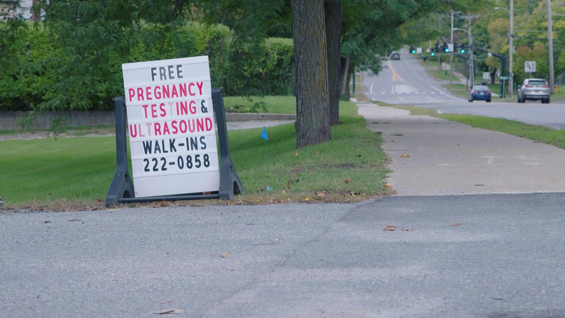 Picture of a sign offering free pregnancy tests and ultrasounds.